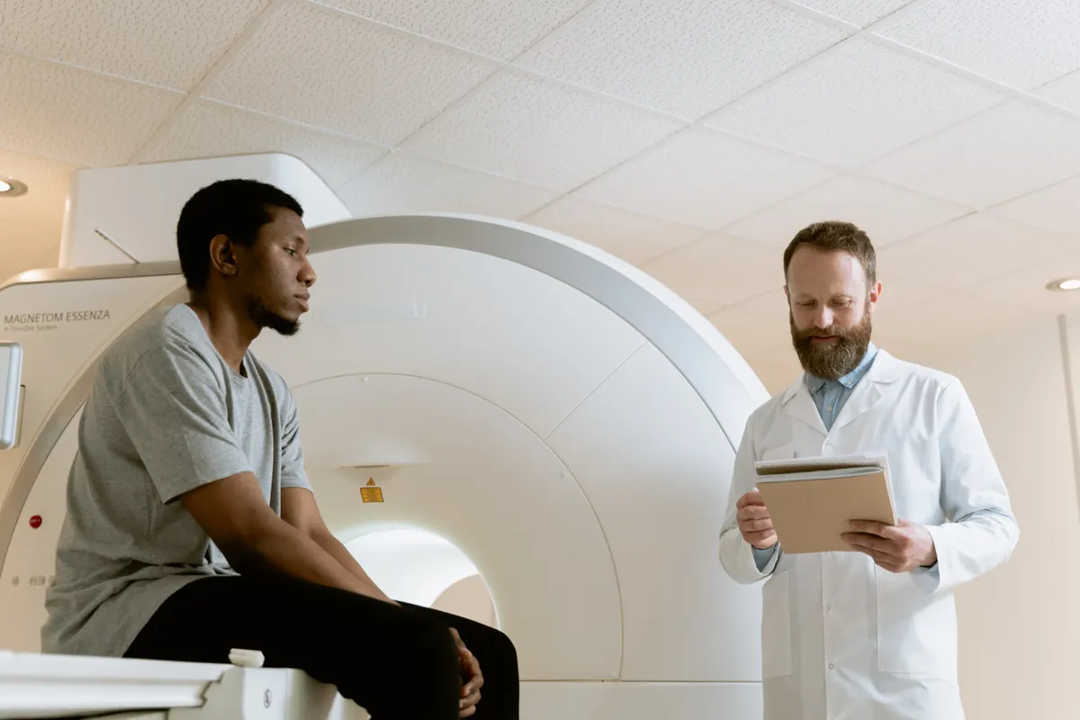 A medical professional reviewing records during a consultation
